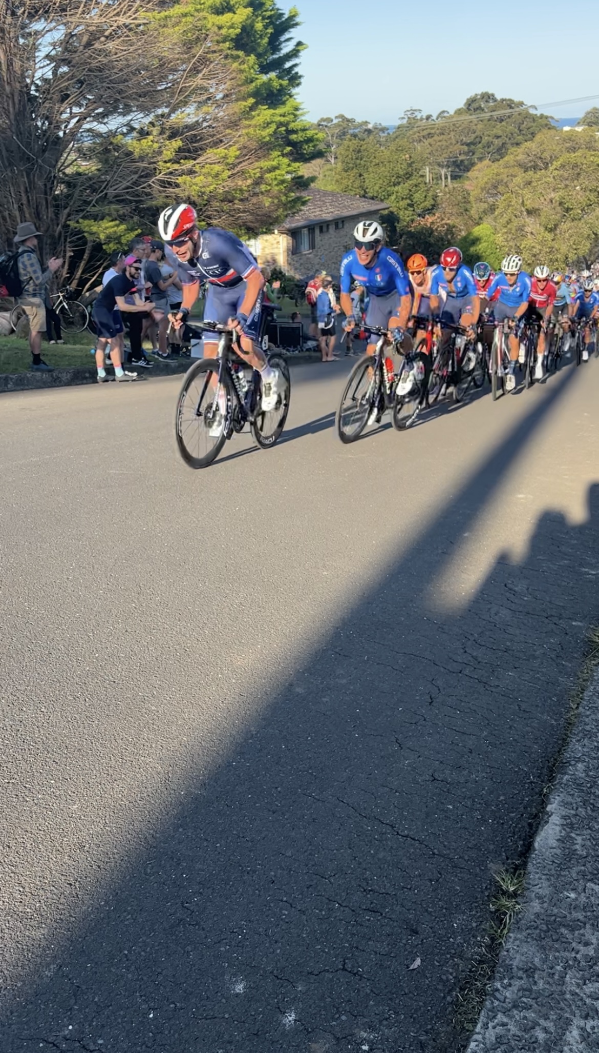 The peloton strung out along the course